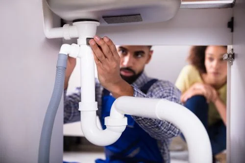 Man Checking Pipes